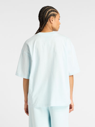 New Balance Women's Reimagined Oversize Blue Tee