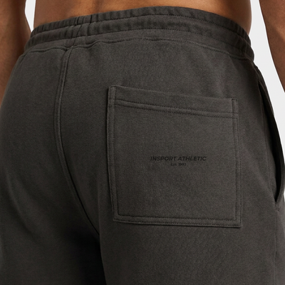 Close-up of the tonal INSPORT Athletic Est. 1983 print on the back pocket of the kids charcoal Scuba short