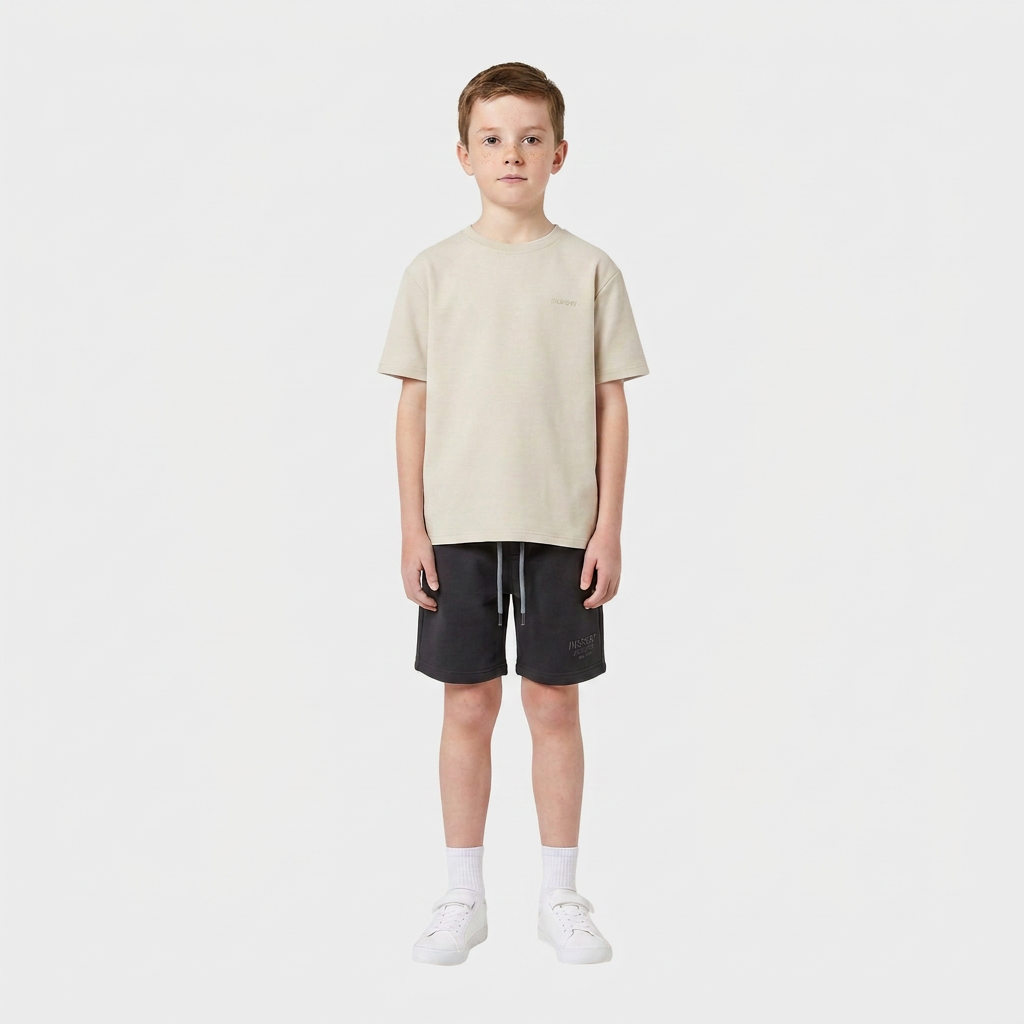 Boy wearing the INSPORT kids Scuba tee in stone, front view