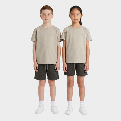 Boy and girl wearing the INSPORT kids Scuba tee in stone with charcoal Scuba shorts