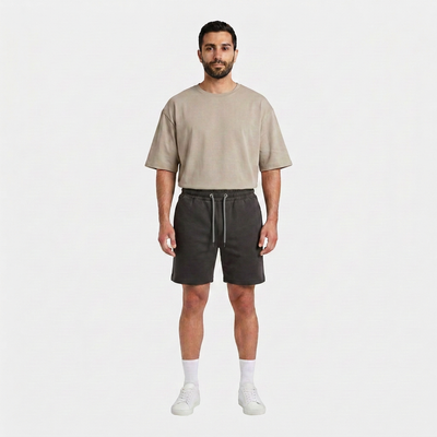 Full length view of the INSPORT mens Scuba short in charcoal worn with the stone Scuba tee