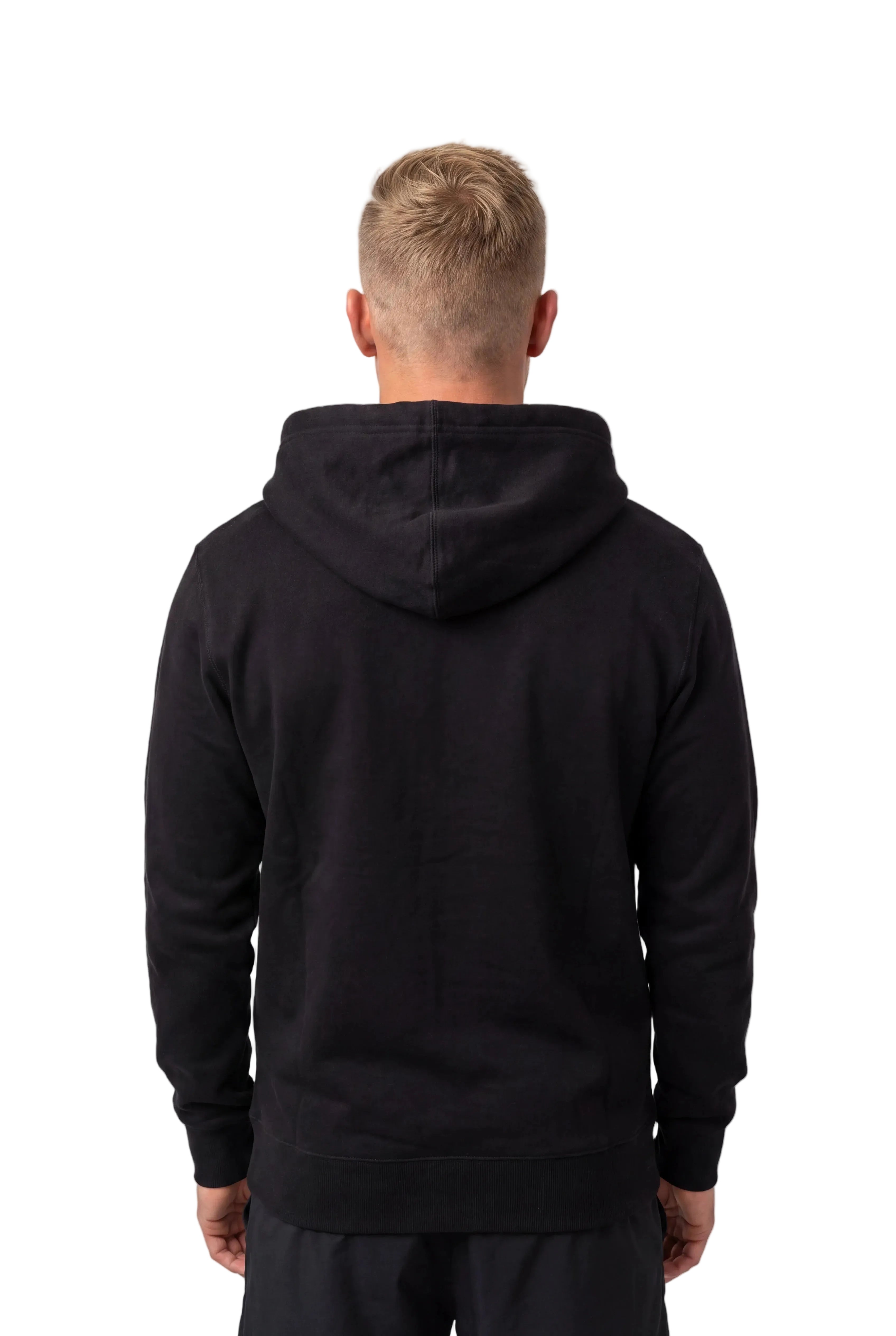 A man viewed from behind wearing a plain black pullover hoodie against a clean white background.