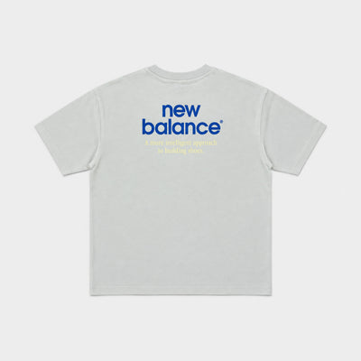 New Balance Men's Intelligent Tee in moss, back flat lay showing the back print