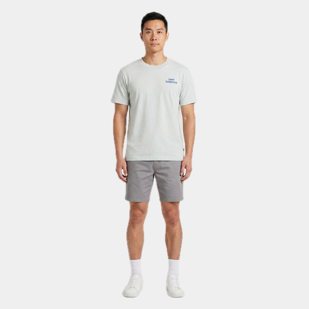 New Balance Men's Intelligent Tee in moss, front view on model