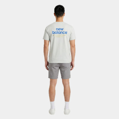 New Balance Men's Intelligent Tee in moss, back view on model showing the back print