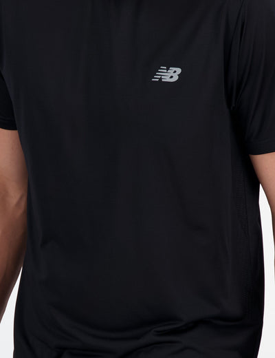 New Balance Sport Essentials Tee in Black – reflective logo detail