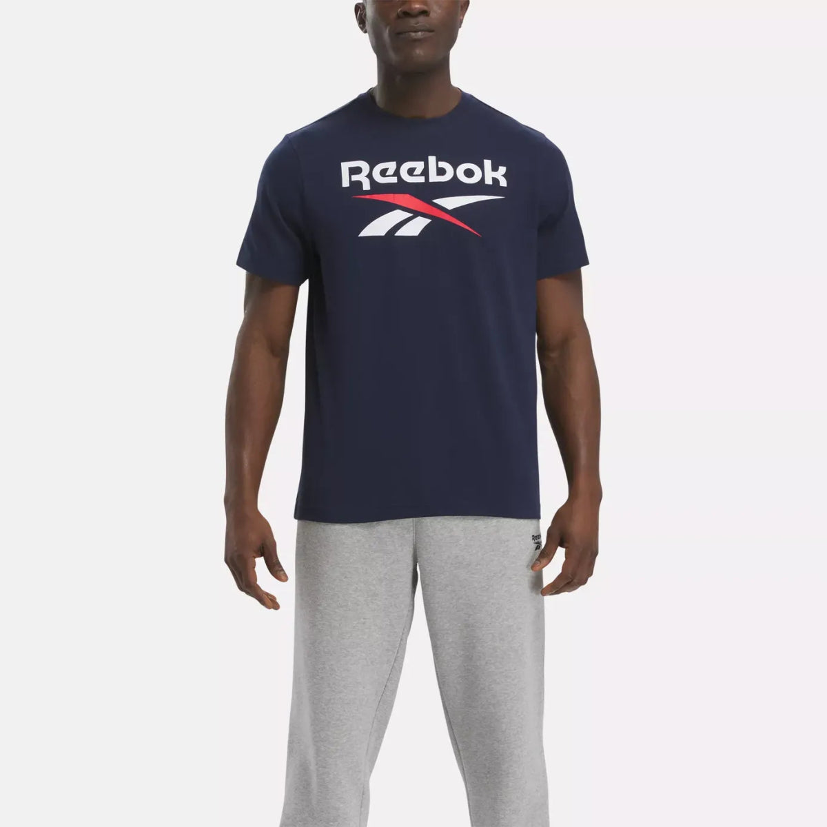 REEBOK MEN S INDENTITY BIG STACKED LOGO NAVY TRAINING TEE INSPORT